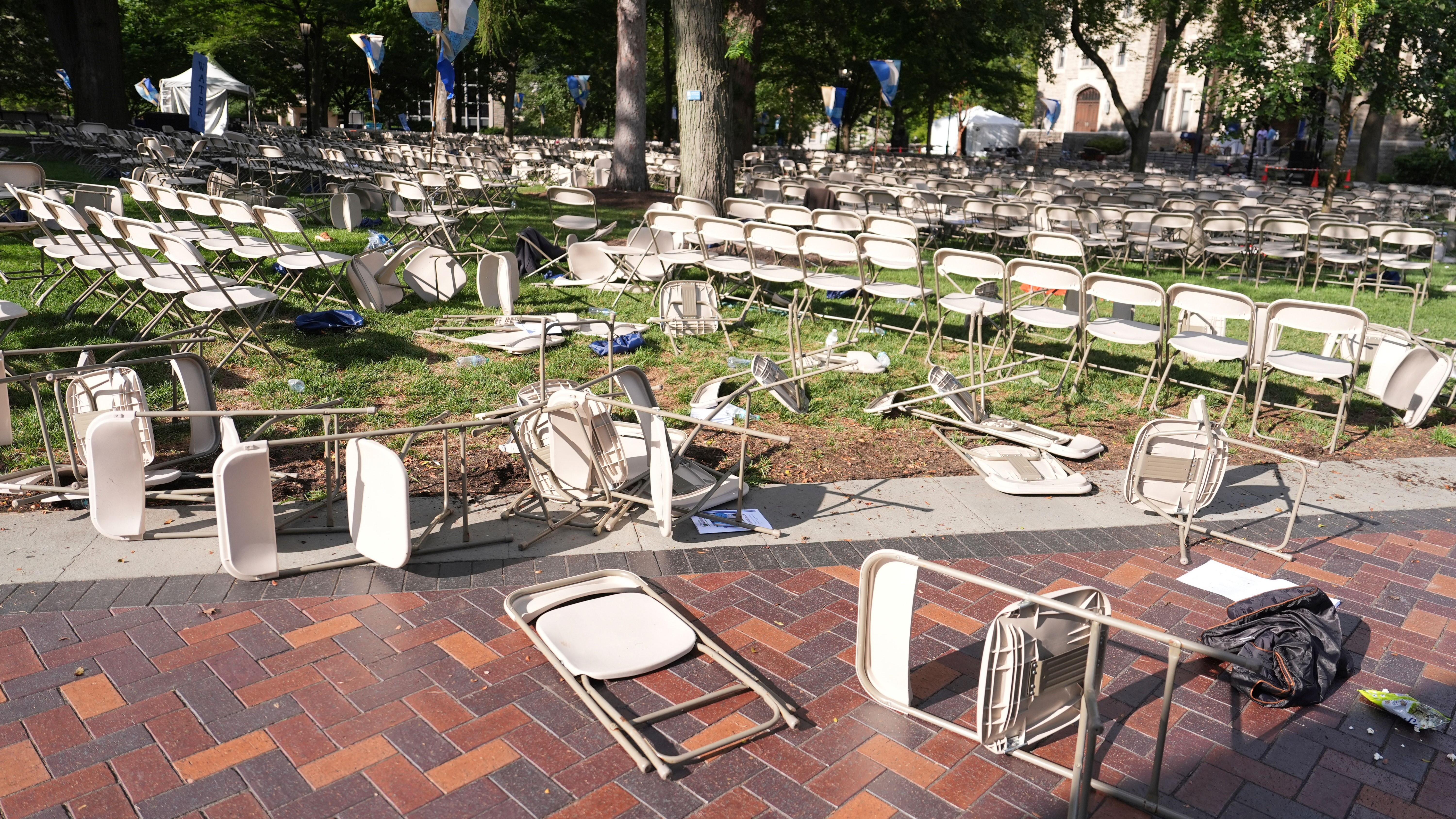 Toppled chairs are scattered on a lawn at Villanova University, where an active shooter was reported on August 21.