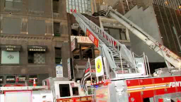 Fire tears through buildings near Times Square