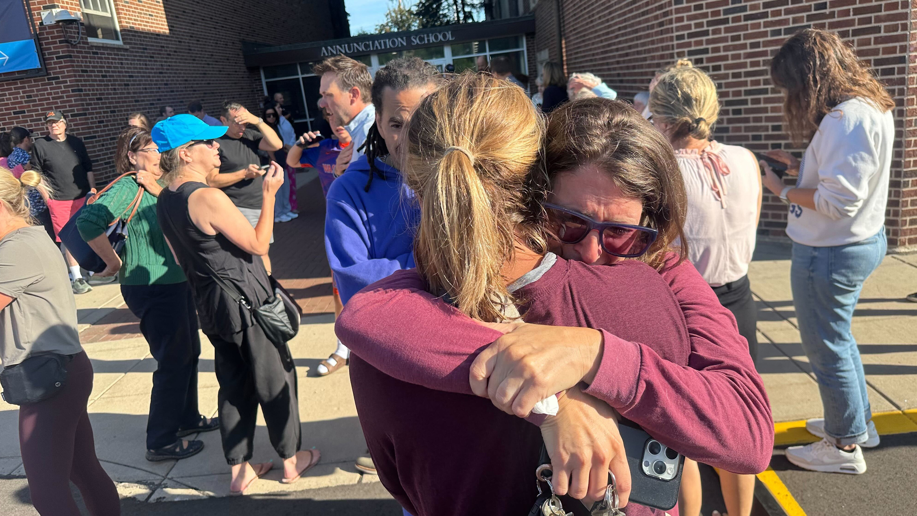 Parents await news of their children's status after shooting at Annunciation Church on Wednesday morning, Aug. 27, 2025 in Minneapolis.