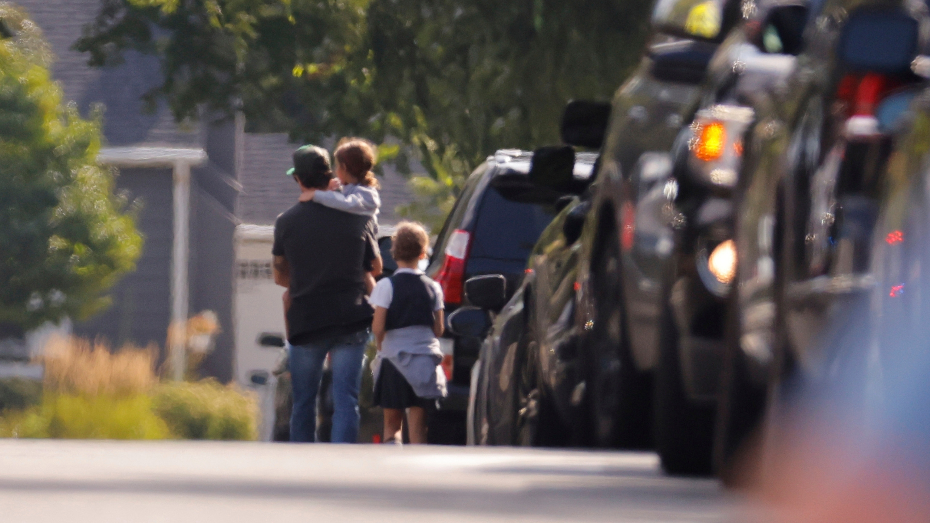 Law enforcement officers gather outside the Annunciation Church's school in response to a reported mass shooting, Wednesday, Aug. 27, 2025, in Minneapolis.