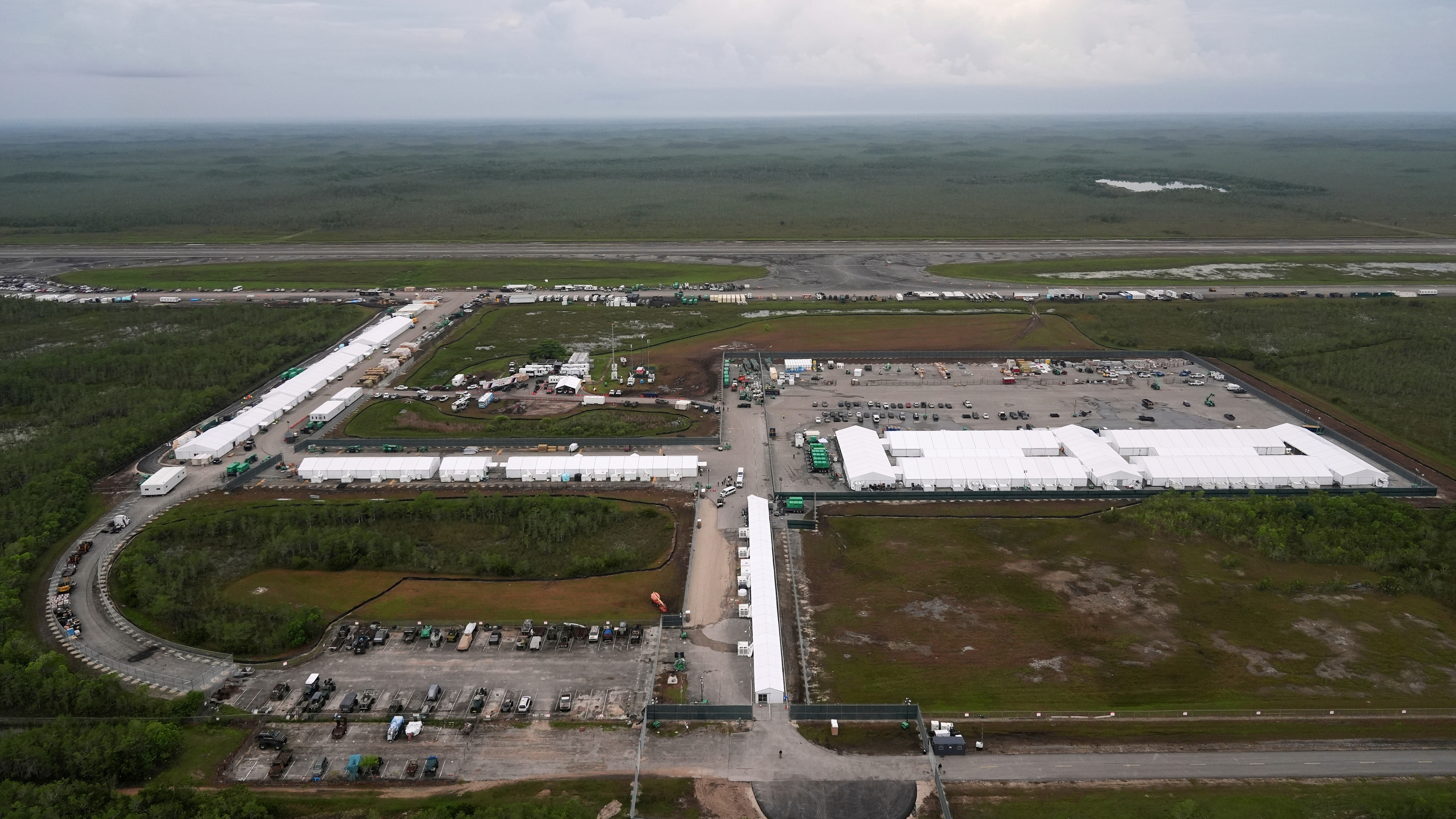 Work progresses on a new migrant detention facility dubbed "Alligator Alcatraz," at Dade-Collier Training and Transition facility in the Florida Everglades, on July 4, 2025, in Ochopee, Fla.