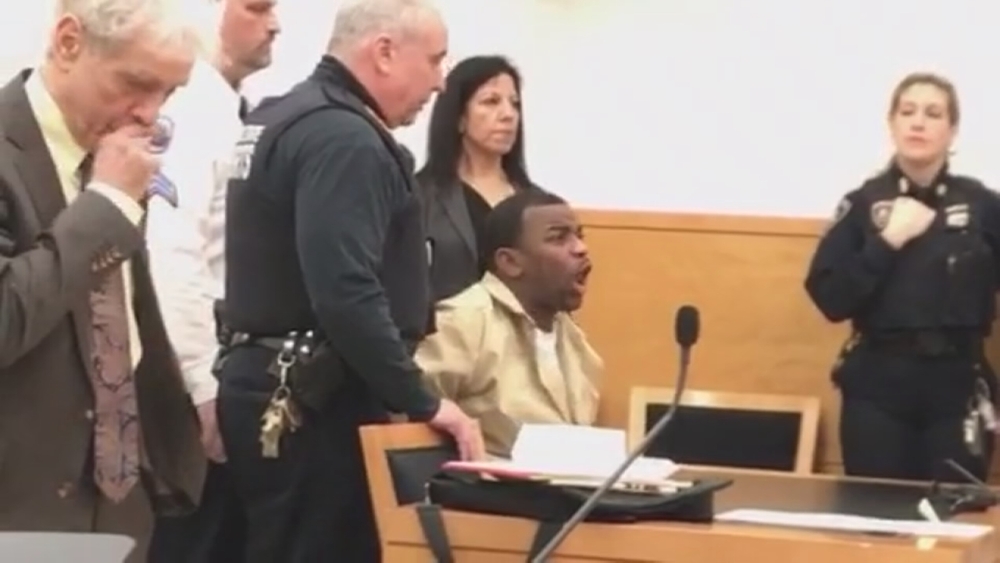 Raw: Murder suspect's outburst during court