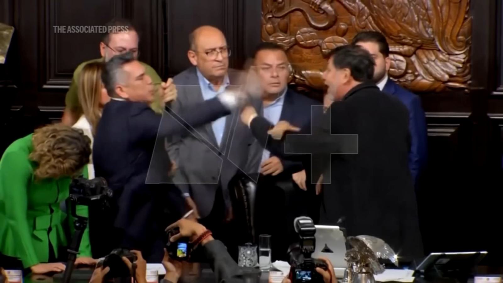 Tempers flare in Mexico senate as disagreeing politicians push and shove each other