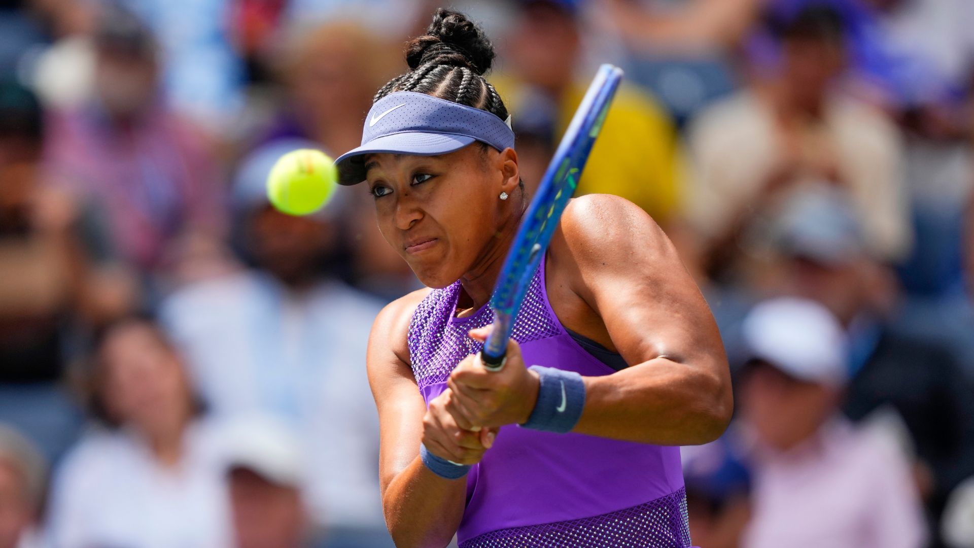 Naomi Osaka, of Japan, returns a shot to Hailey Baptiste, of the U.S., during the second round of the U.S. Open tennis championships, Thursday, Aug. 28, 2025, in New York.