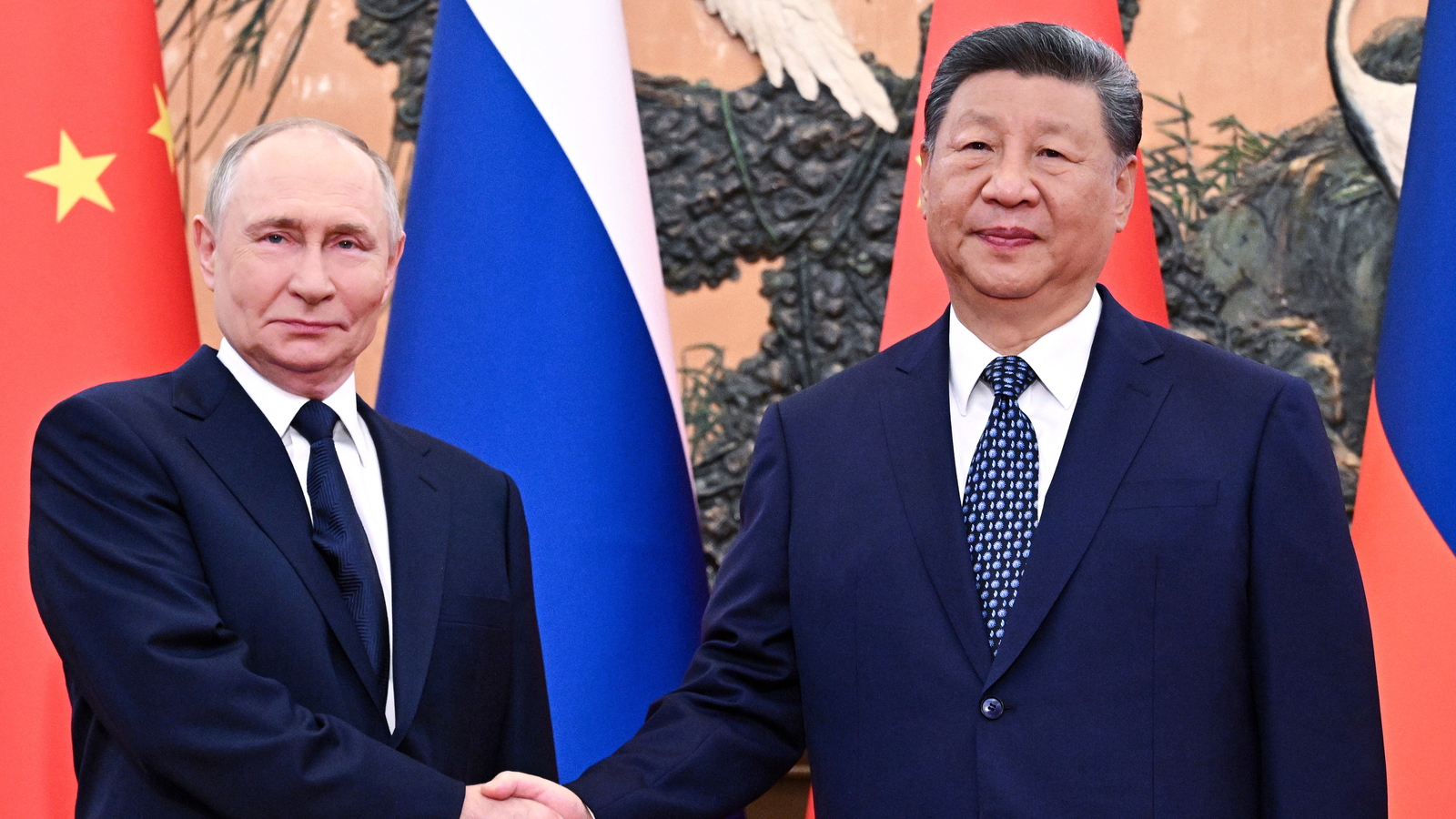 Xi and Putin reaffirm 'old friend' ties during meetings in the face of US challenges
