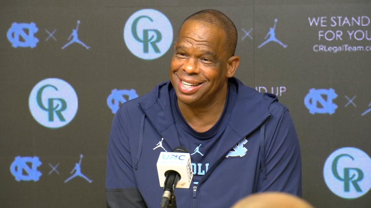 UNC basketball coach Hubert Davis meets with the media