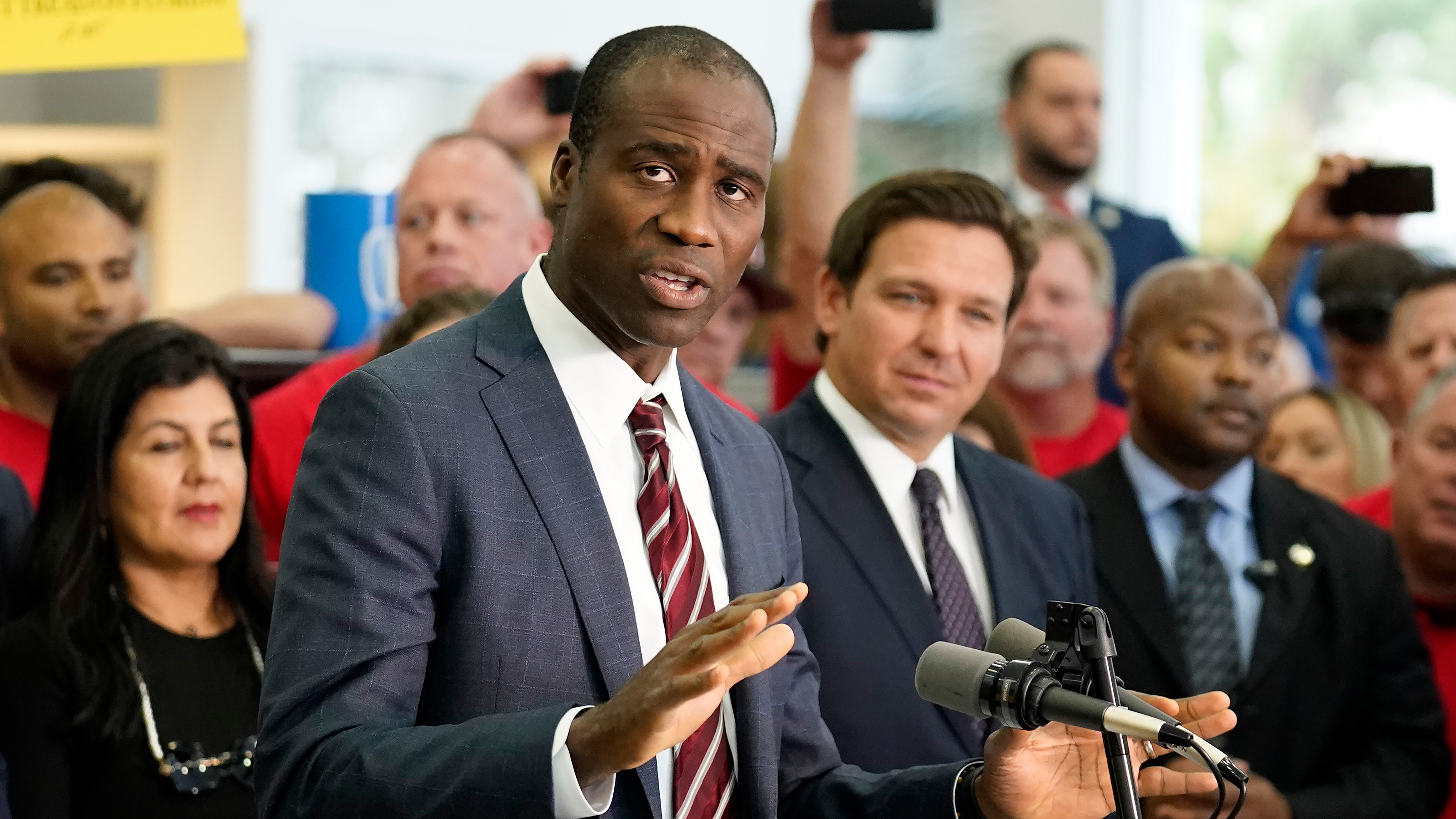 Florida Surgeon General Dr. Joseph Ladapo gestures as speaks to supporters and members of the media before a bill signing by Gov. Ron DeSantis, Nov. 18, 2021, in Brandon, Fla.