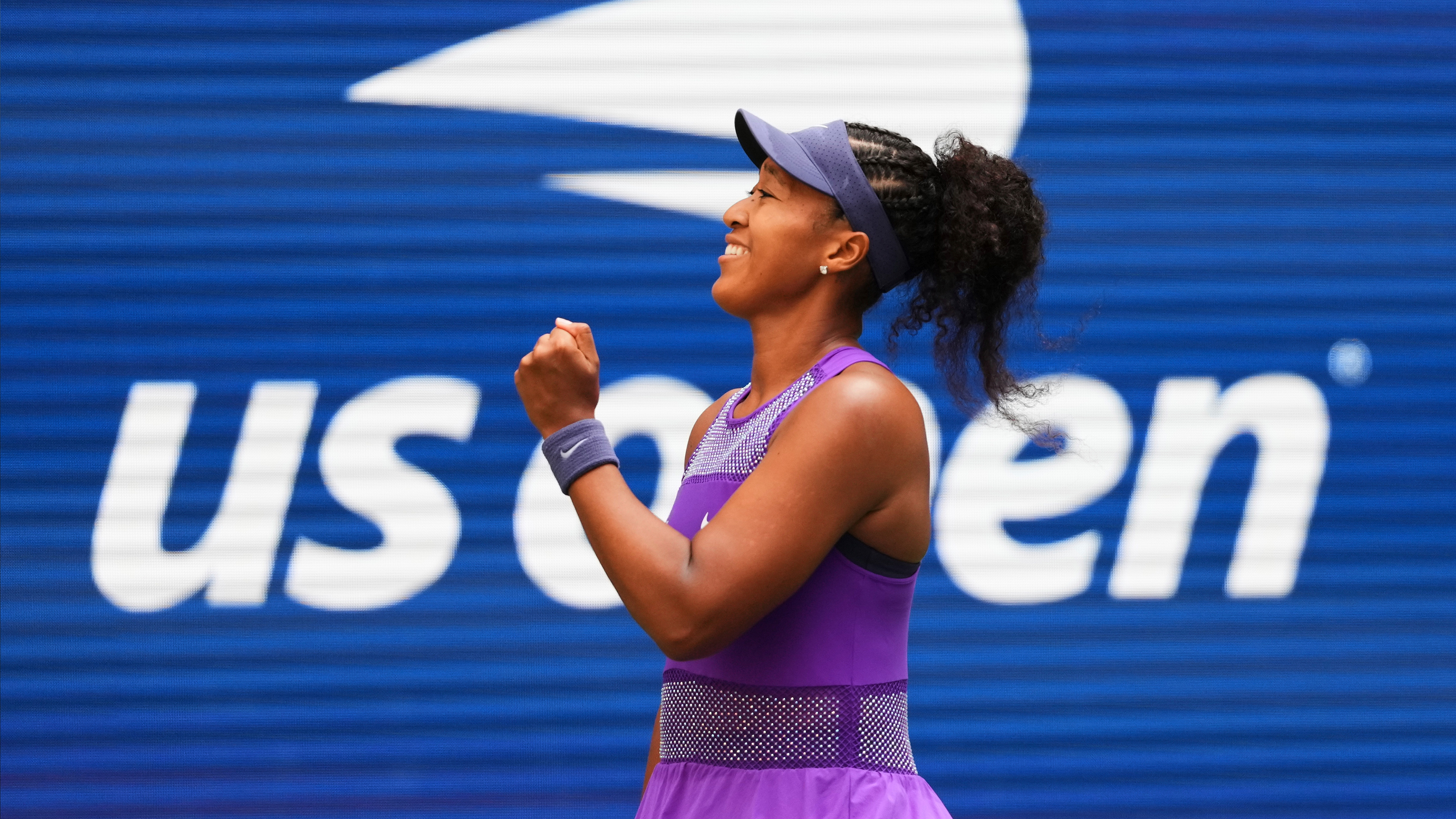 Naomi Osaka, of Japan, celebrates after winning a match against Coco Gauff, of the United States, during the fourth round of the US Open tennis championships, Monday, Sept. 1, 2025, in New York.