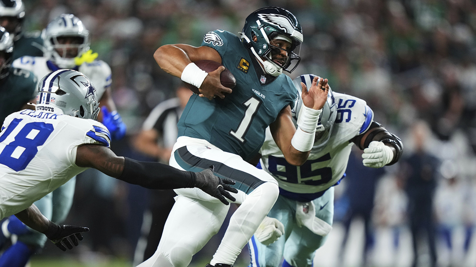 Defending champion Philadelphia Eagles edge Dallas Cowboys 24-20 in wild, lightning-delayed NFL season opener