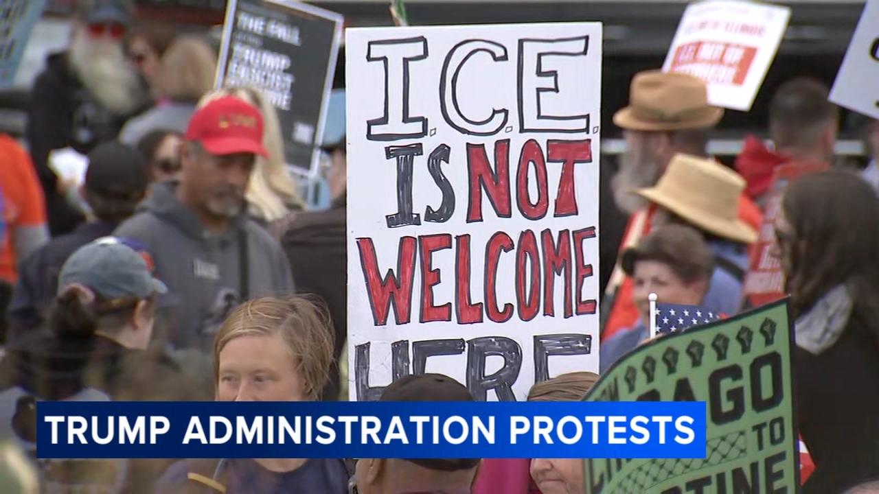 Massive crowds march through downtown, criticize Trump administration
