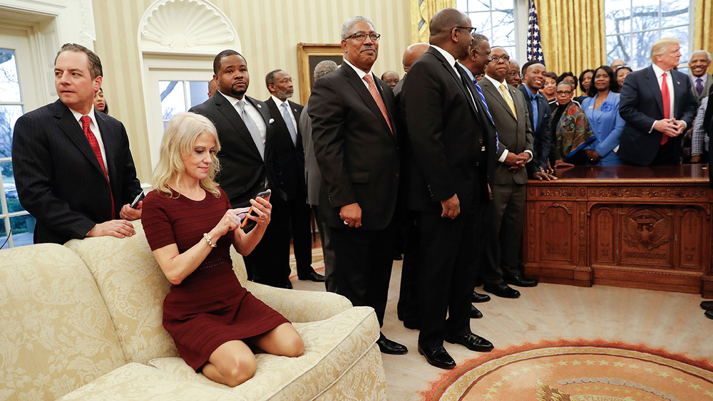 Trump advisor criticized for propping feet and legs on oval office