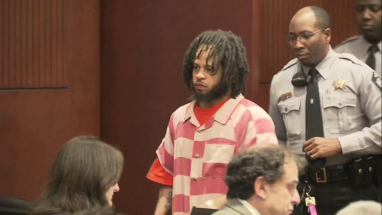 Nathan Holden enters court