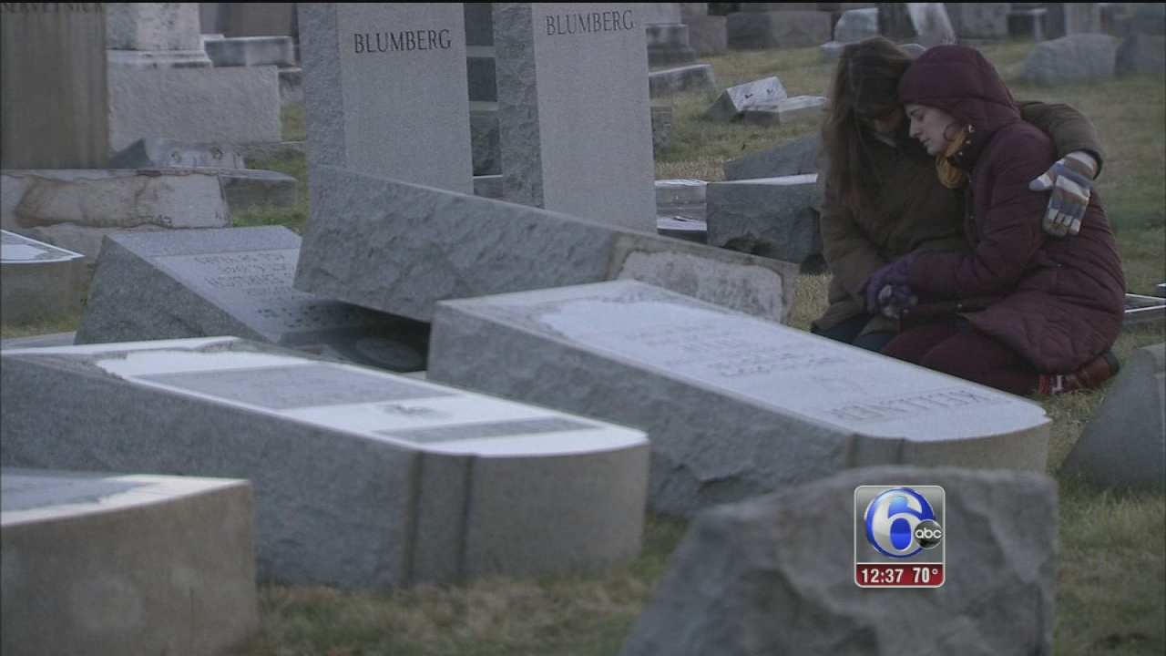 Volunteers continue to repair damage at Jewish cemetery