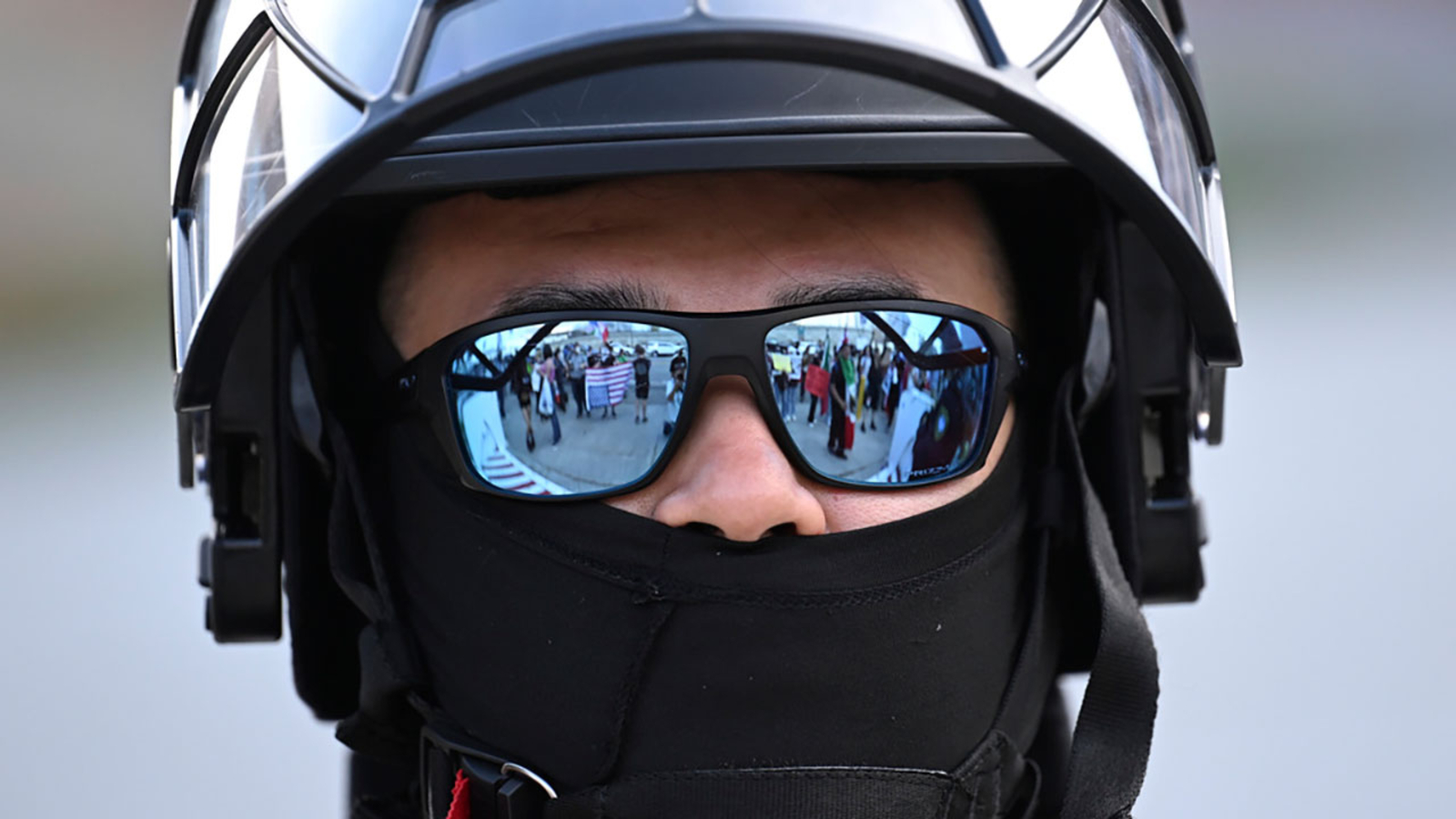 California lawmakers pass bill barring authorities from wearing face masks