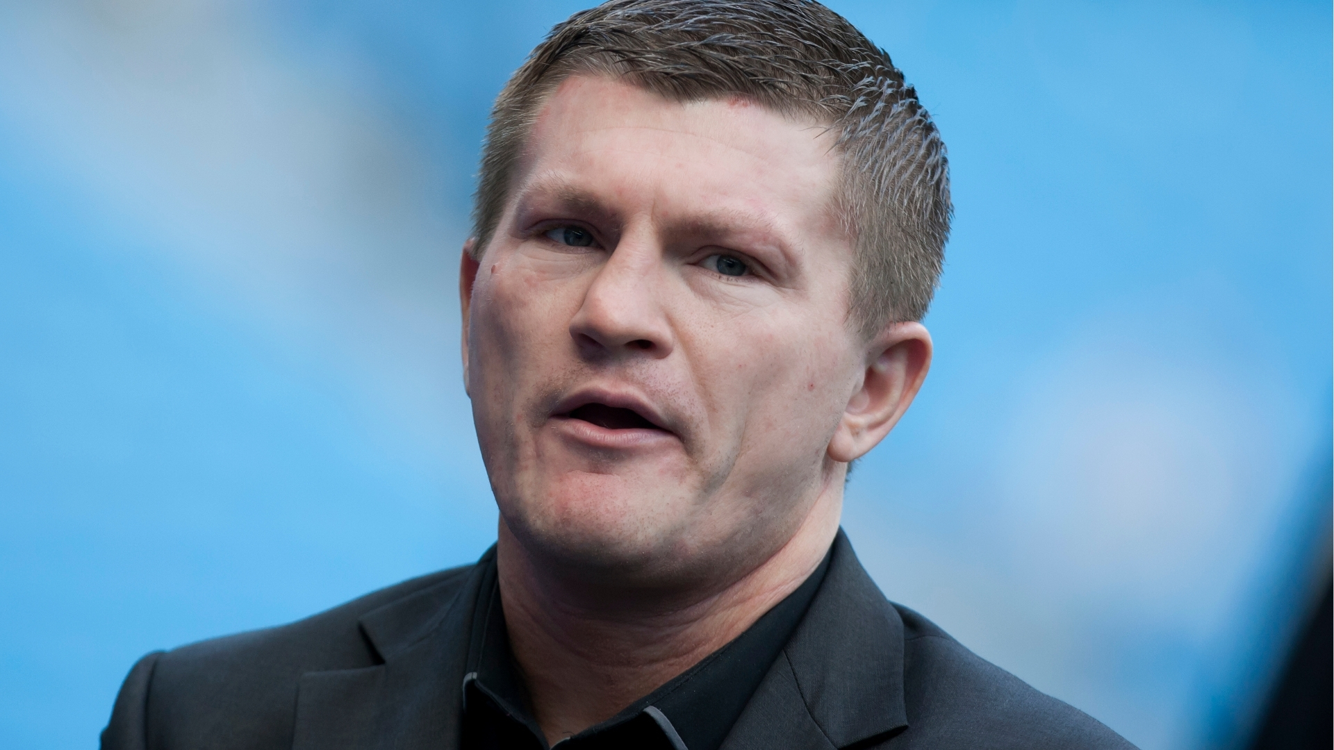 FILE - Boxer Ricky Hatton stands by the transportation earlier Manchester City's English Premier League shot lucifer against Manchester United astatine the Etihad Stadium, Sunday Sept. 22, 2013.