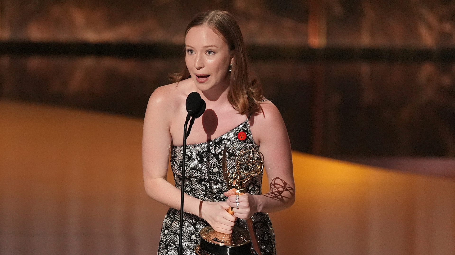 Hannah Einbinder accepts the award for outstanding supporting actress in a comedy series for "Hacks" during the 77th Primetime Emmy Awards on Sunday, Sept. 14, 2025 in Los Angeles.