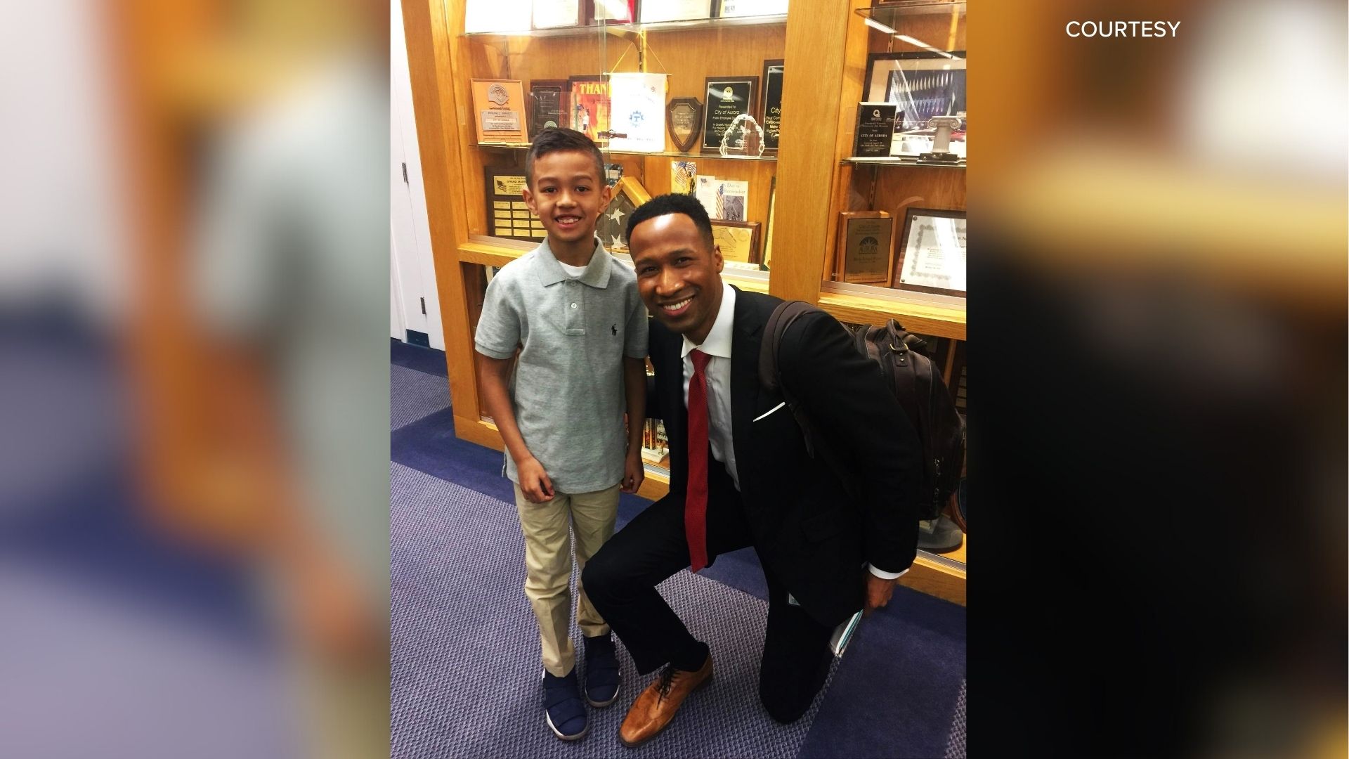 Then-7 year old Ethan Vahl in 2018 meeting his favorite ABC7 Anchor Terrell Brown with Ethan's mentoring group, Boys II Men.