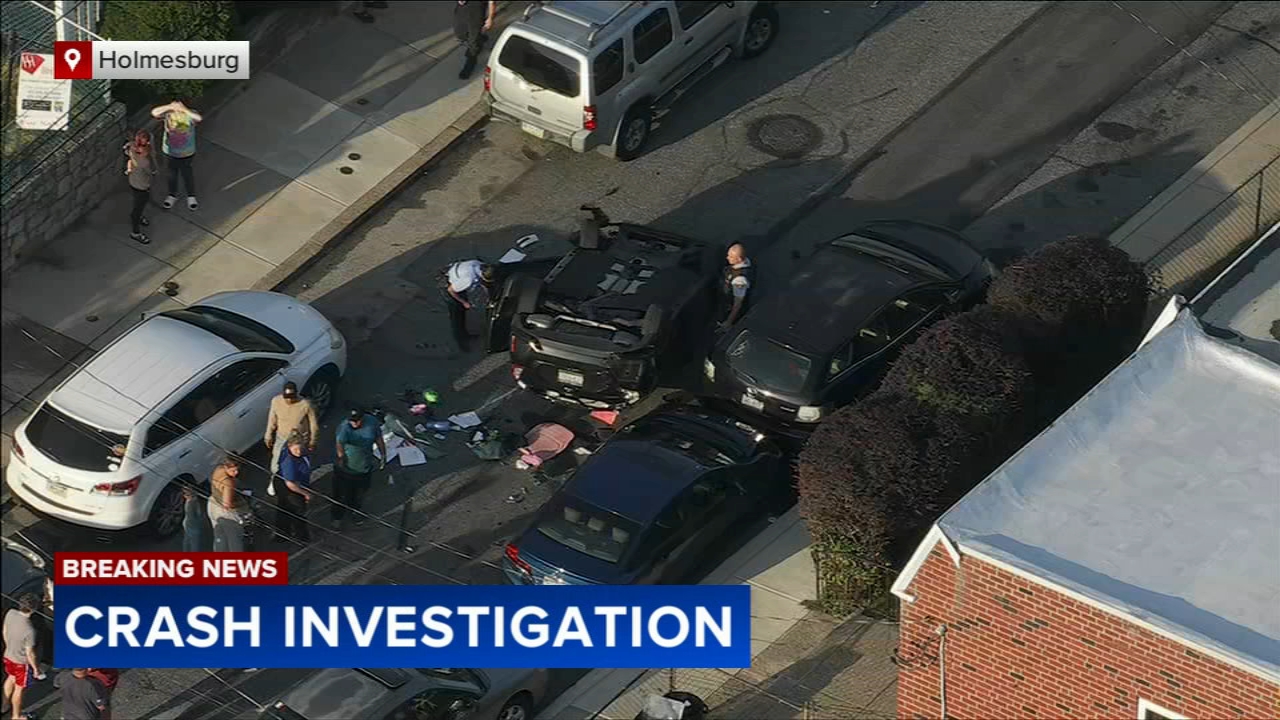 Car strikes parked cars, flips over in Holmesburg
