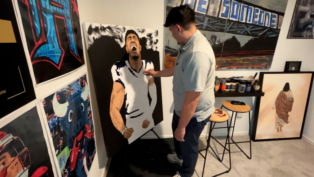 Artist trades his paintbrush for a football 