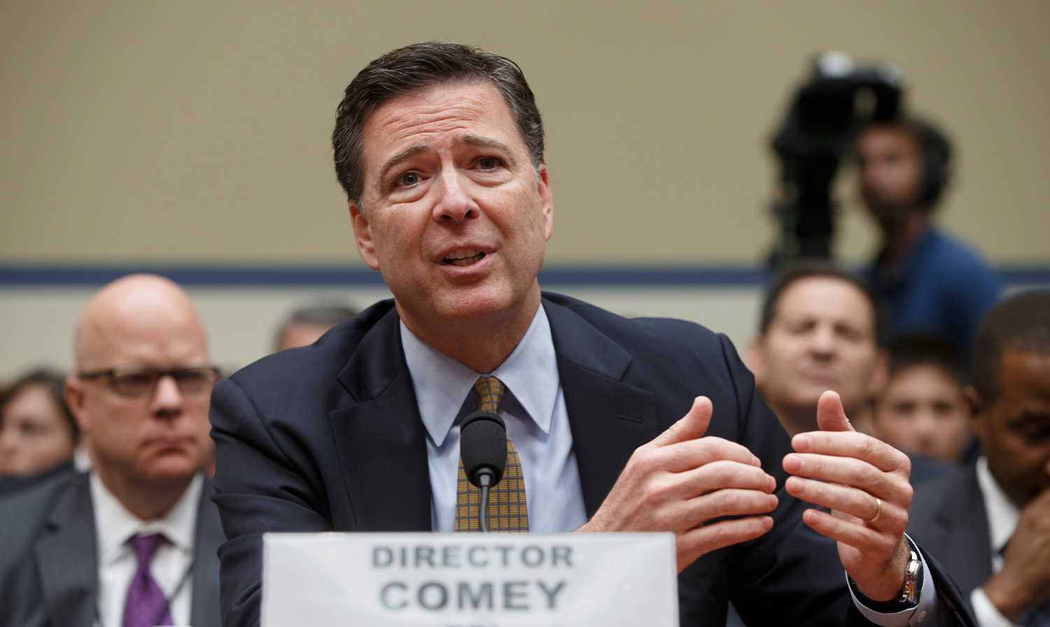 FILE - FBI Director James Comey testifies on Capitol Hill in Washington before the House Oversight Committee on July 7, 2016.