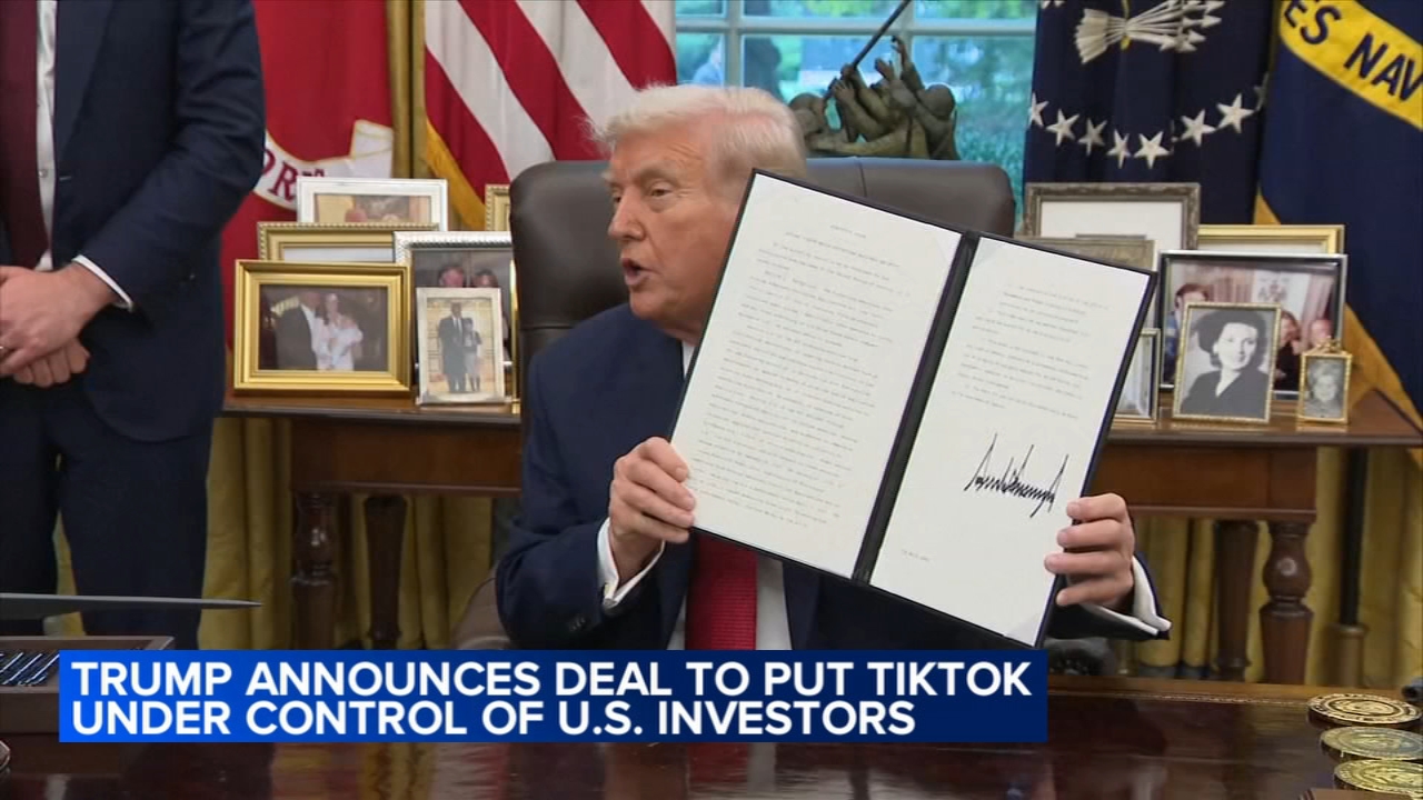 Trump signs deal to hand TikTok to US investors