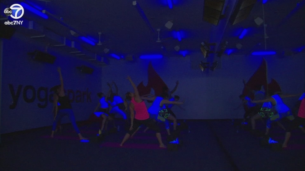 030717-wabc-black-light-yoga-vid