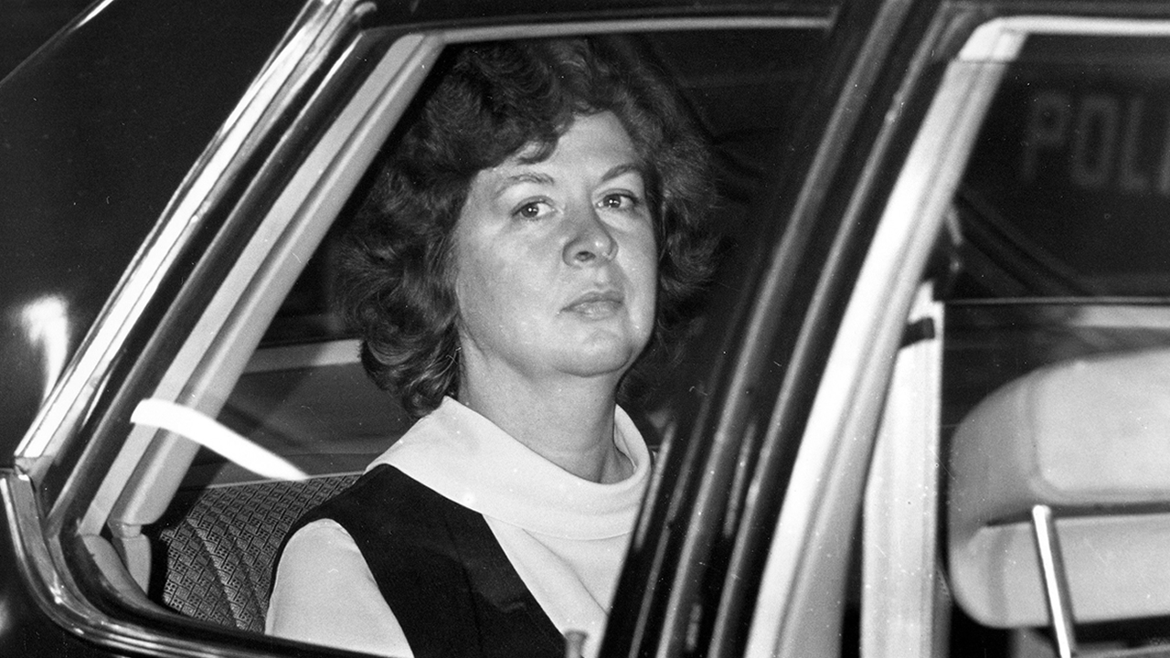 Sara Jane Moore looks out the window of a U.S. marshal's car in San Francisco on Dec. 16, 1975. Moore is the woman who fired a gun at President Gerald Ford in 1975.