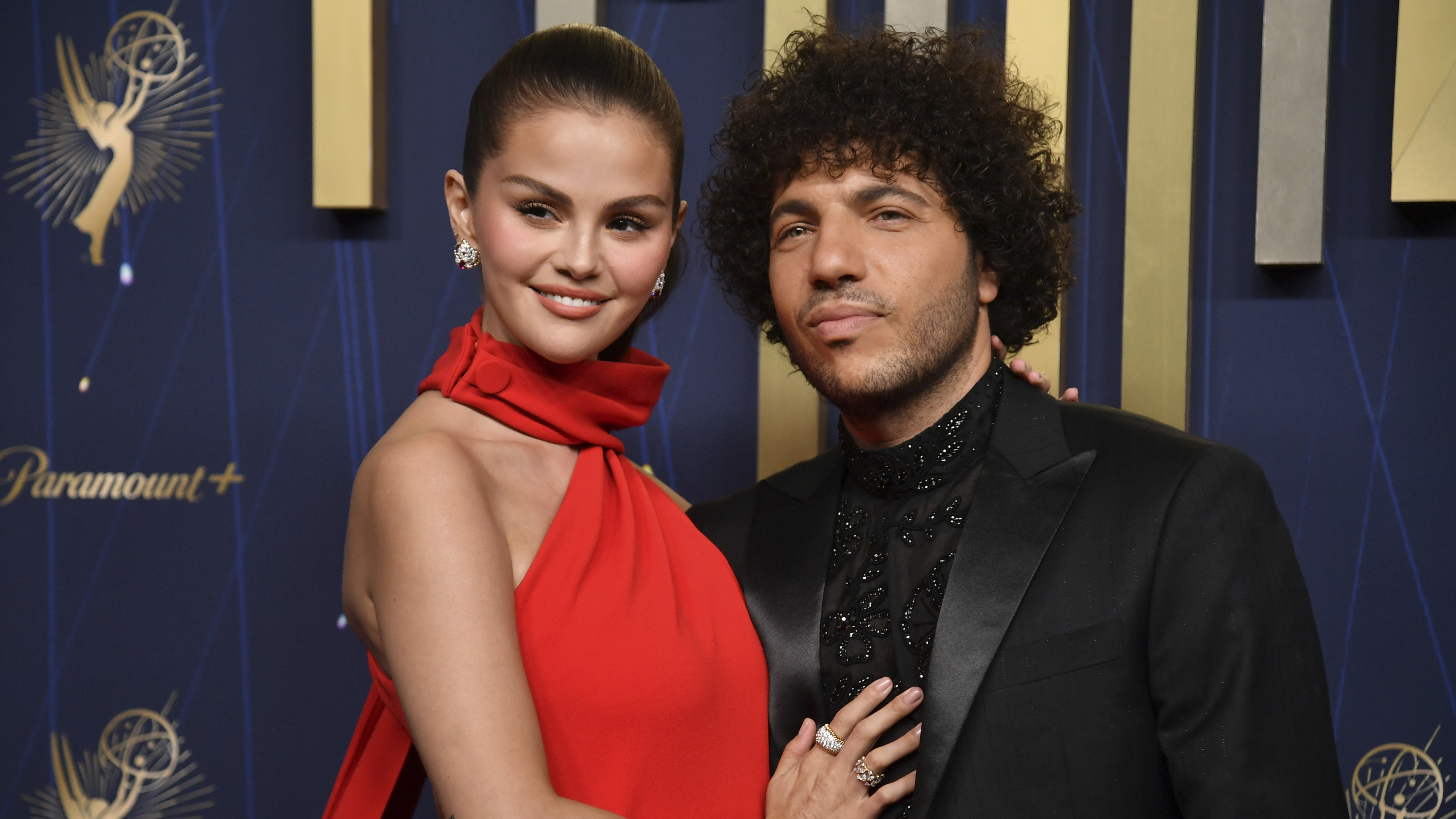 Selena Gomez and Benny Blanco arrive at the 77th Primetime Emmy Awards on Sunday, Sept. 14, 2025, at the Peacock Theater in Los Angeles.