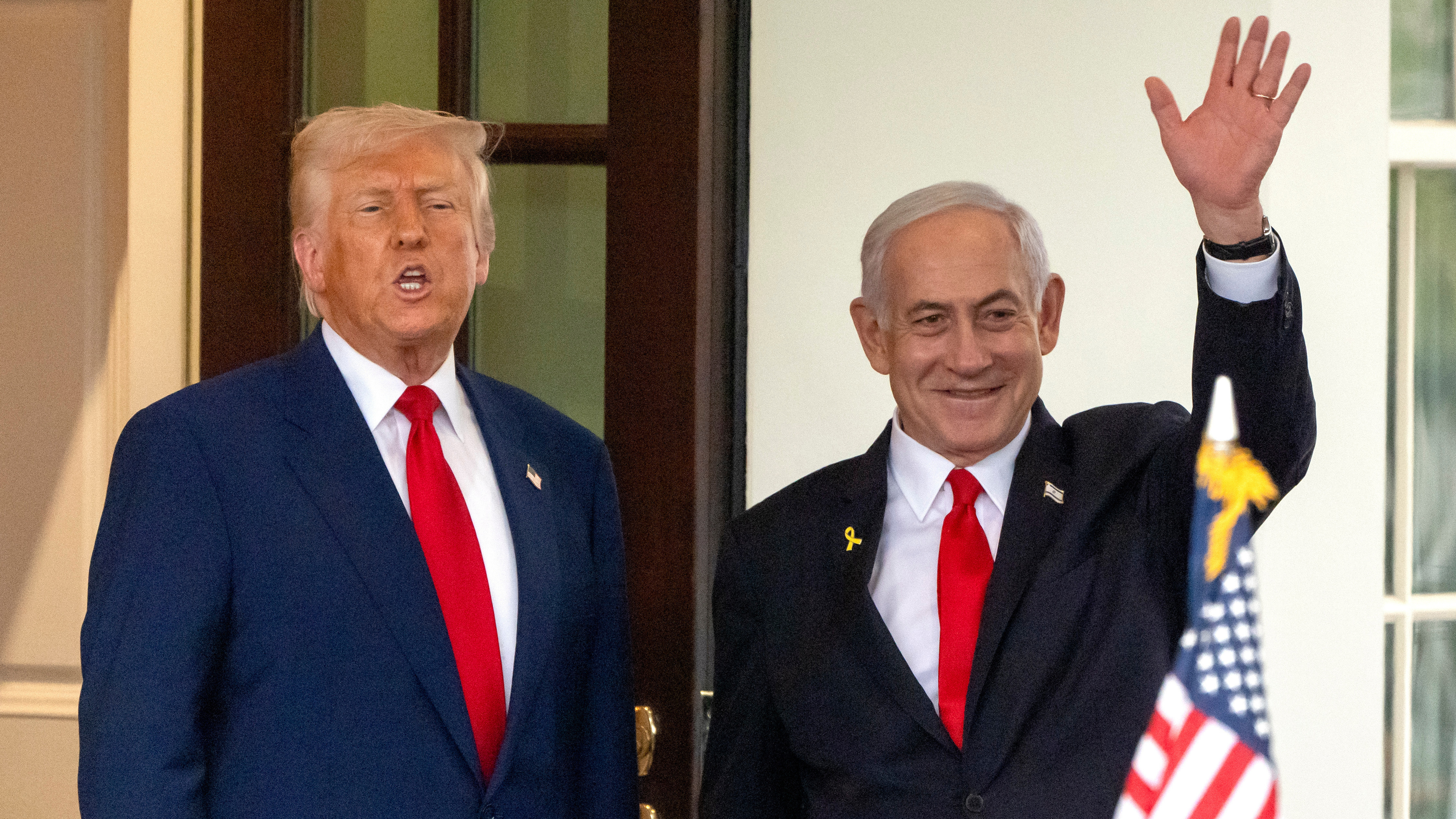 President Donald Trump, left, speaks as Israel's Prime Minister Benjamin Netanyahu waves upon leaving the West Wing of the White House, April 7, 2025, in Washington.