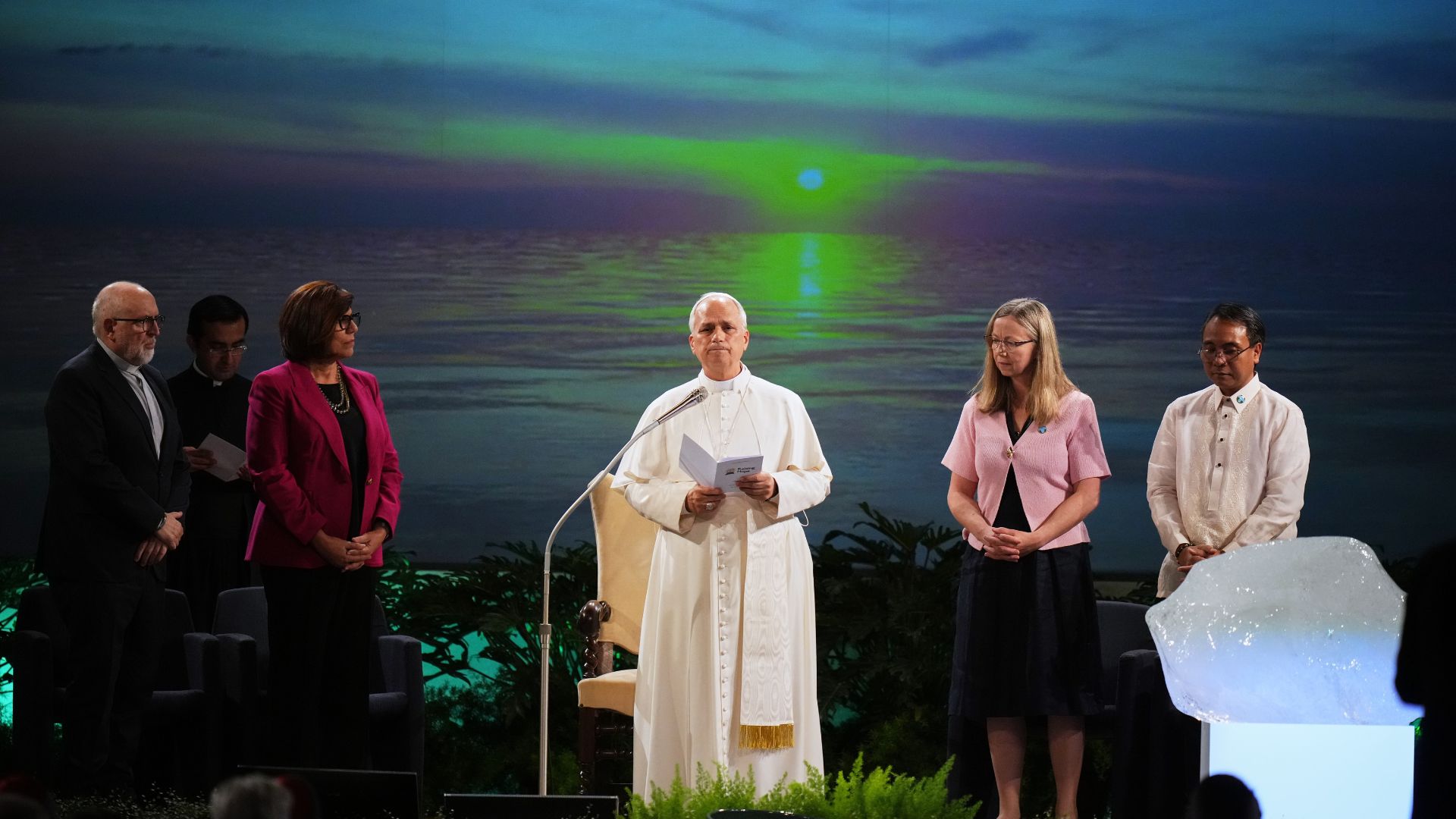 Pope Leo XIV, center, attends the International conference "Raising Hope for Climate Justice", in Castel Gandolfo, Italy, Wednesday, Oct. 1, 2025.