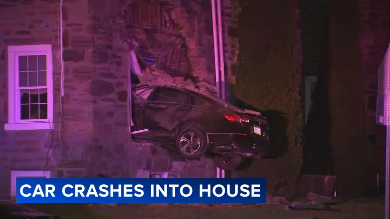 Driver runs off after car goes airborne, crashes through window of Frankford home