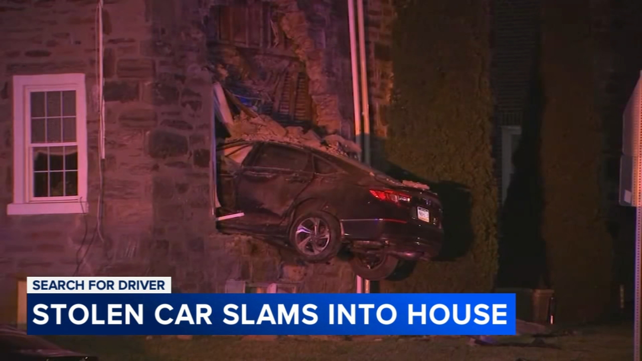 Driver runs off after car goes airborne, crashes through home's window