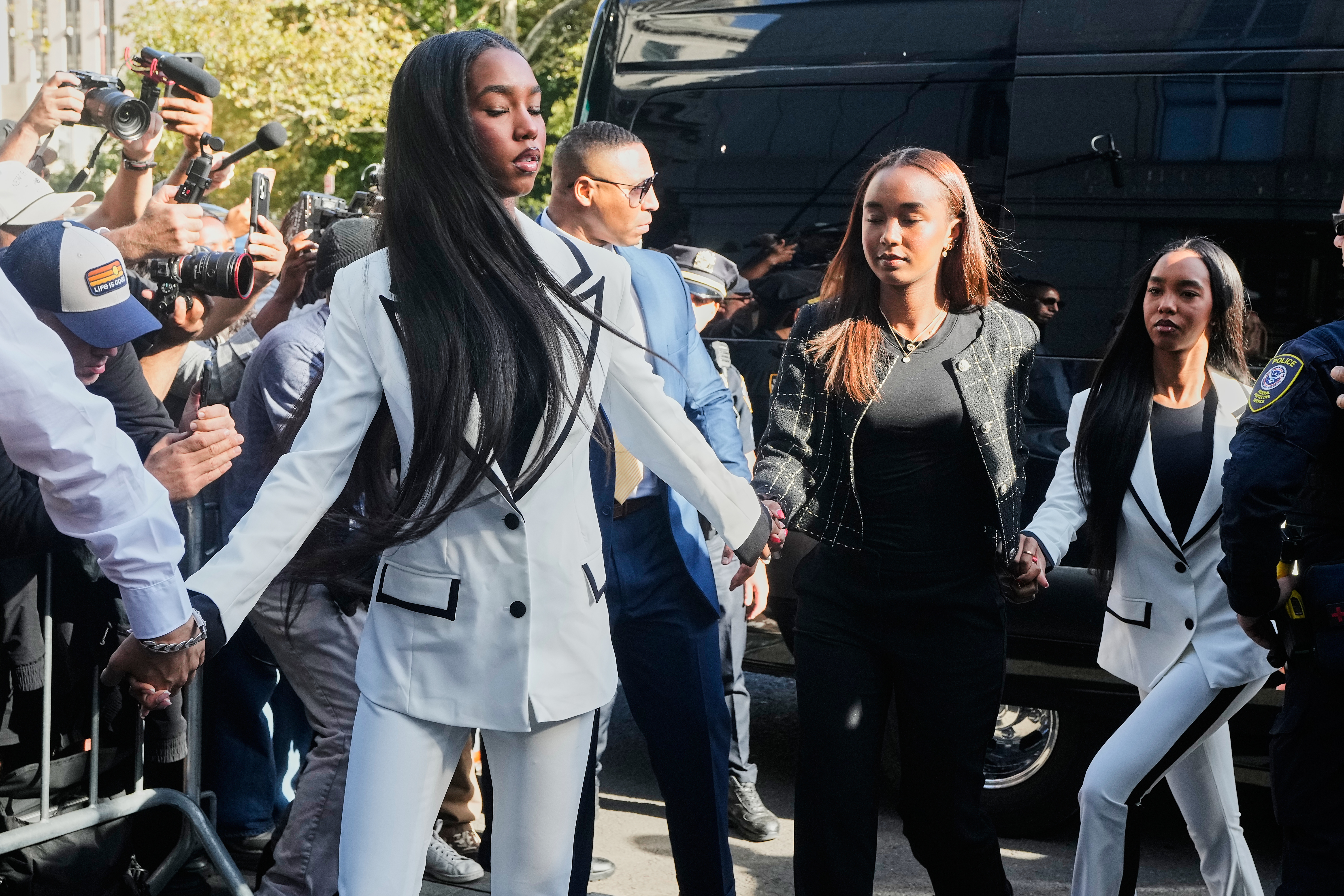 The train daughters of Sean "Diddy" Combs, arrive at Federal Court, in New York, Friday, Oct. 3, 2025.