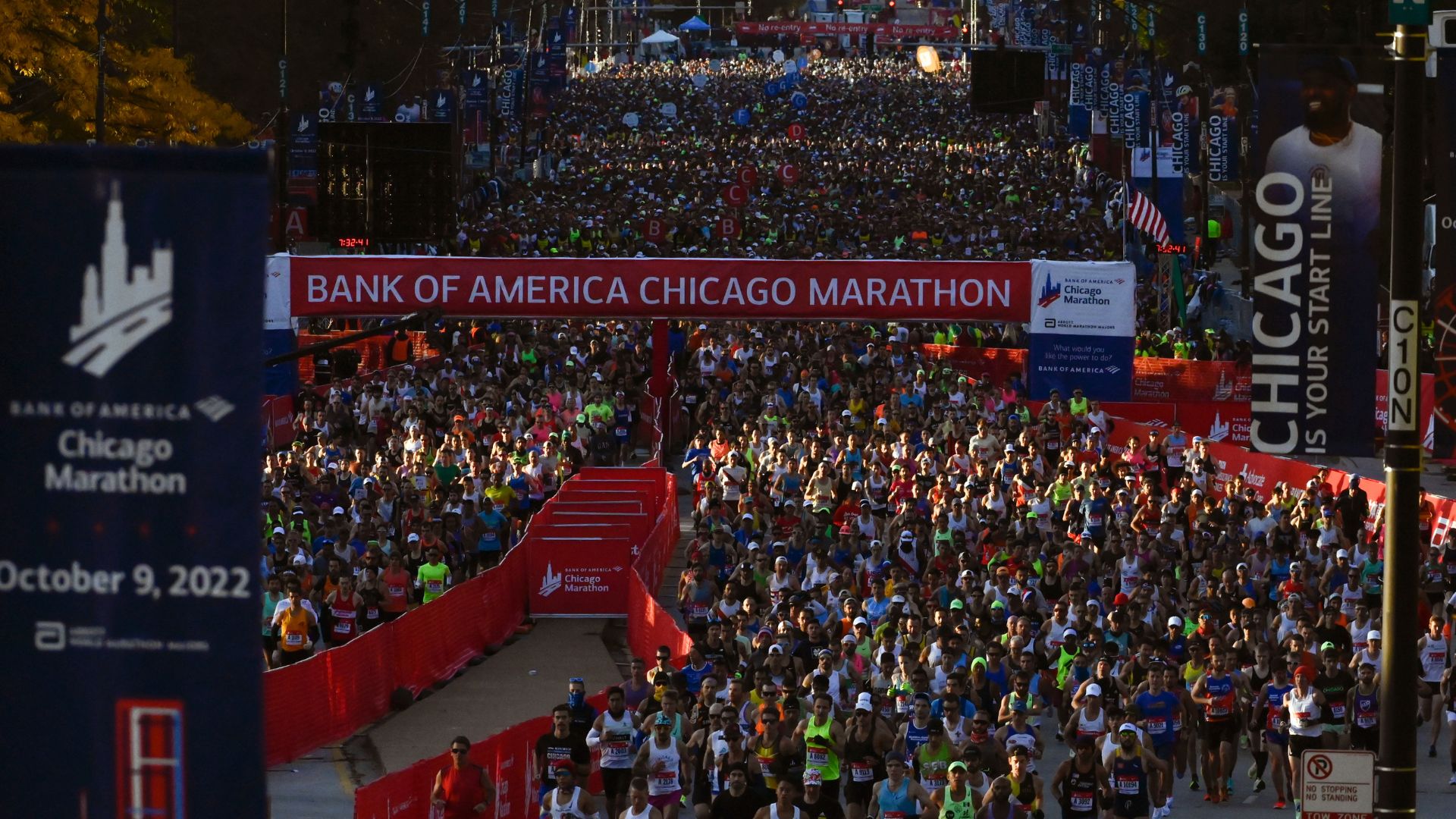 Runners start the Chicago Marathon, Sunday, Oct. 9, 2022, in Chicago.