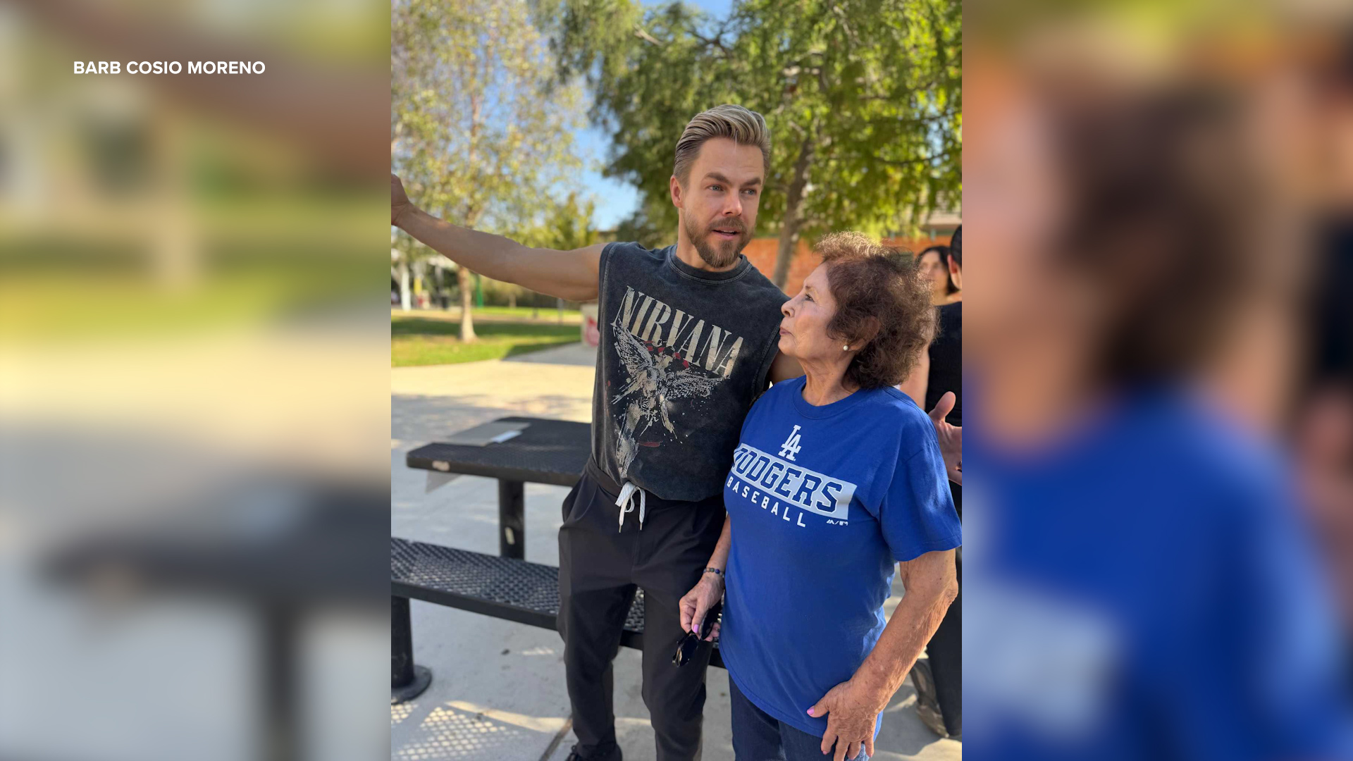 "Dancing with the Stars" judge Derek Hough snaps a photo with a member of the Sanchez family in Burbank, CA.