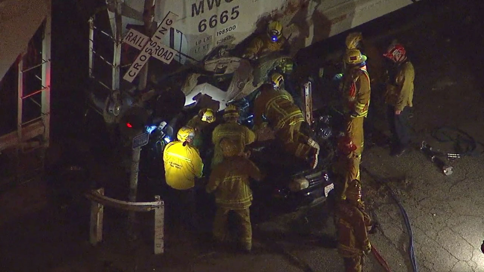 Woman rescued, unharmed after car crashes into train in Commerce - ABC7 ...