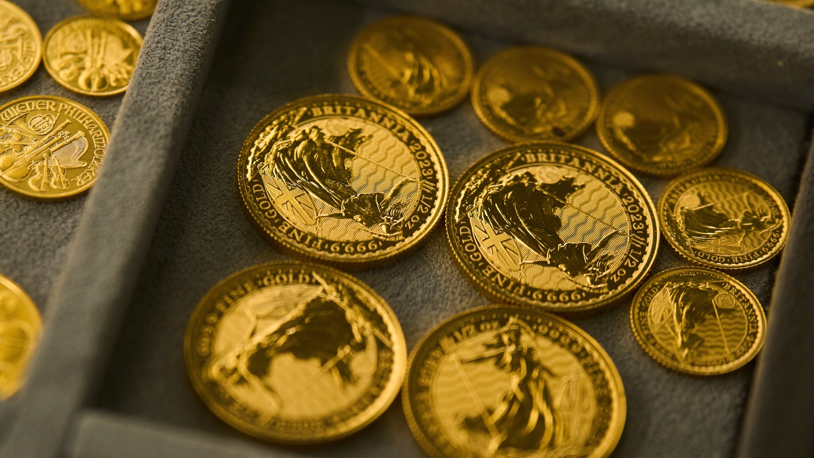 Gold futures rise above $4,000 per ounce for the 1st time reaching a record high