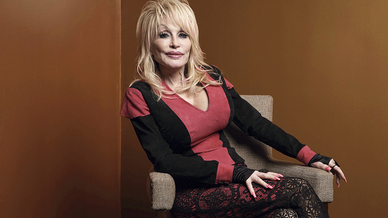 FILE - Dolly Parton poses at the Carnegie Medal of Philanthropy Ceremony in New York, on Oct. 13, 2022. 