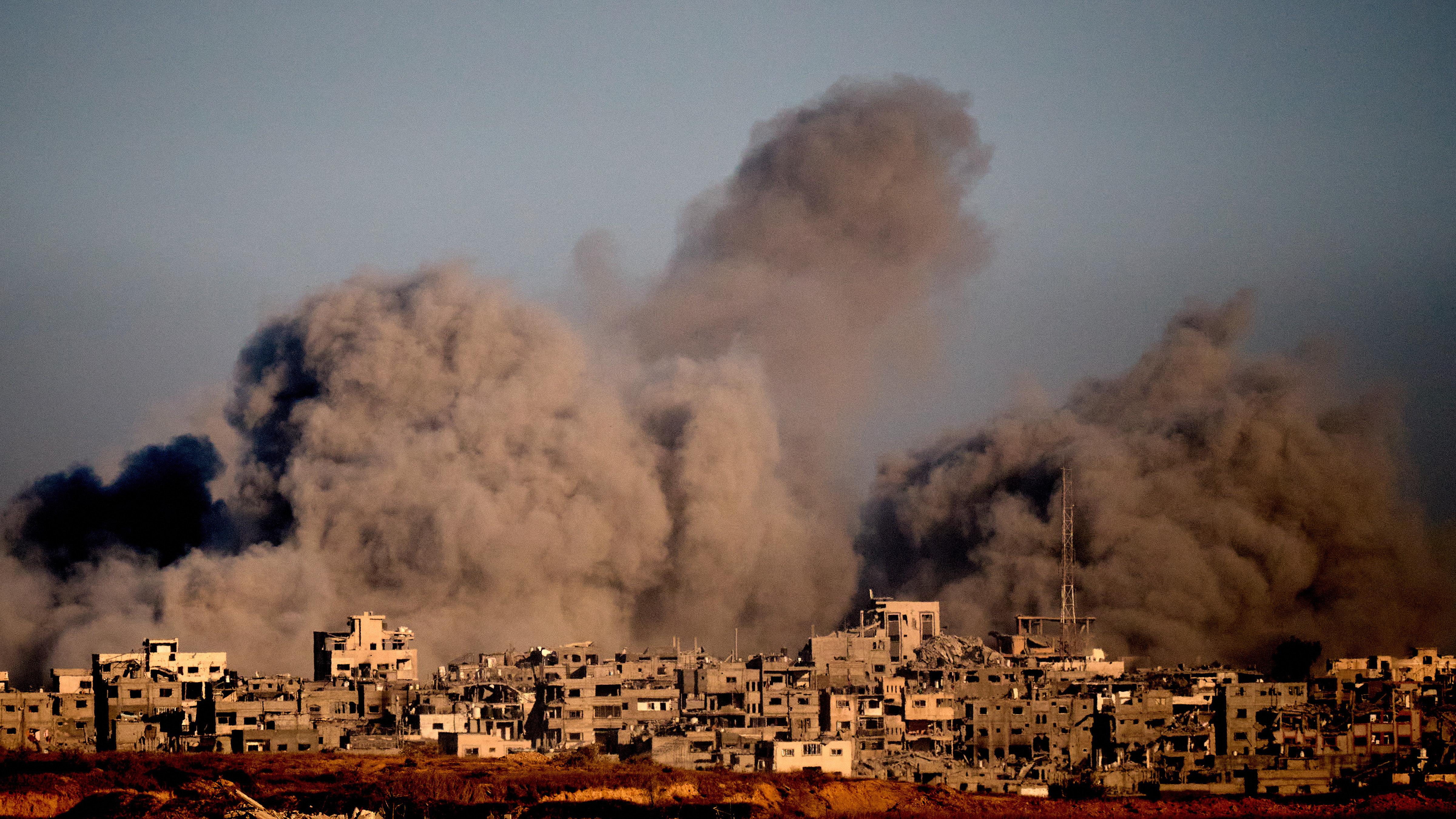 Smoke rises to the sky following an Israeli military strike in the northern Gaza Strip, as seen from southern Israel, Wednesday, Oct. 8, 2025.