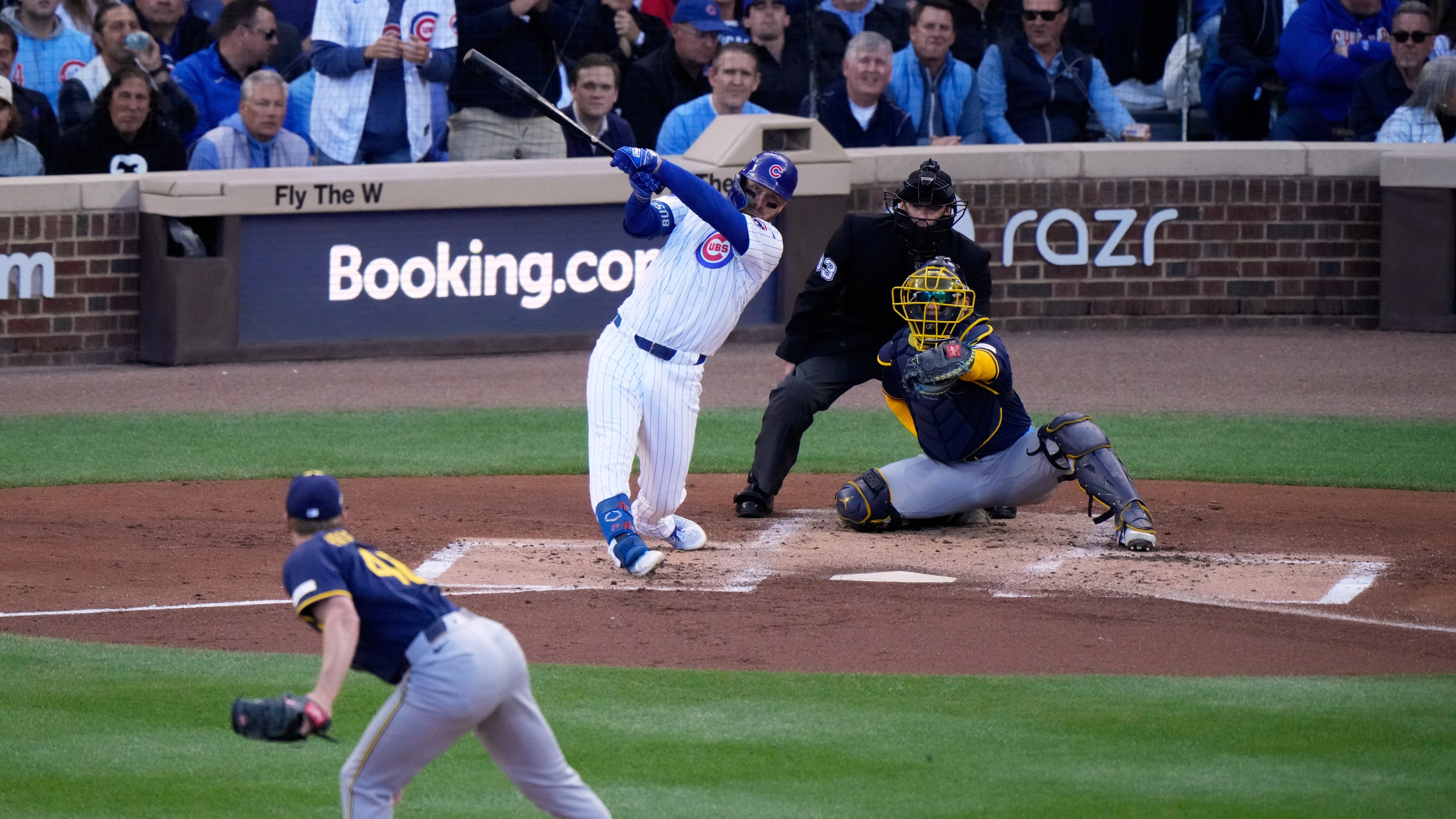 Chicago Cubs' Michael Busch hits a home run during the first inning of the National League Division Series Game 3 against the Milwaukee Brewers Wednesday, Oct. 8, 2025, in Chicago.
