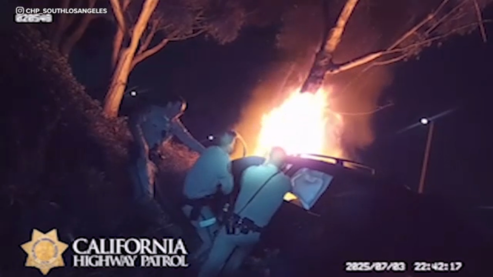 Video shows CHP officers rescue unconscious driver from burning car in Gardena