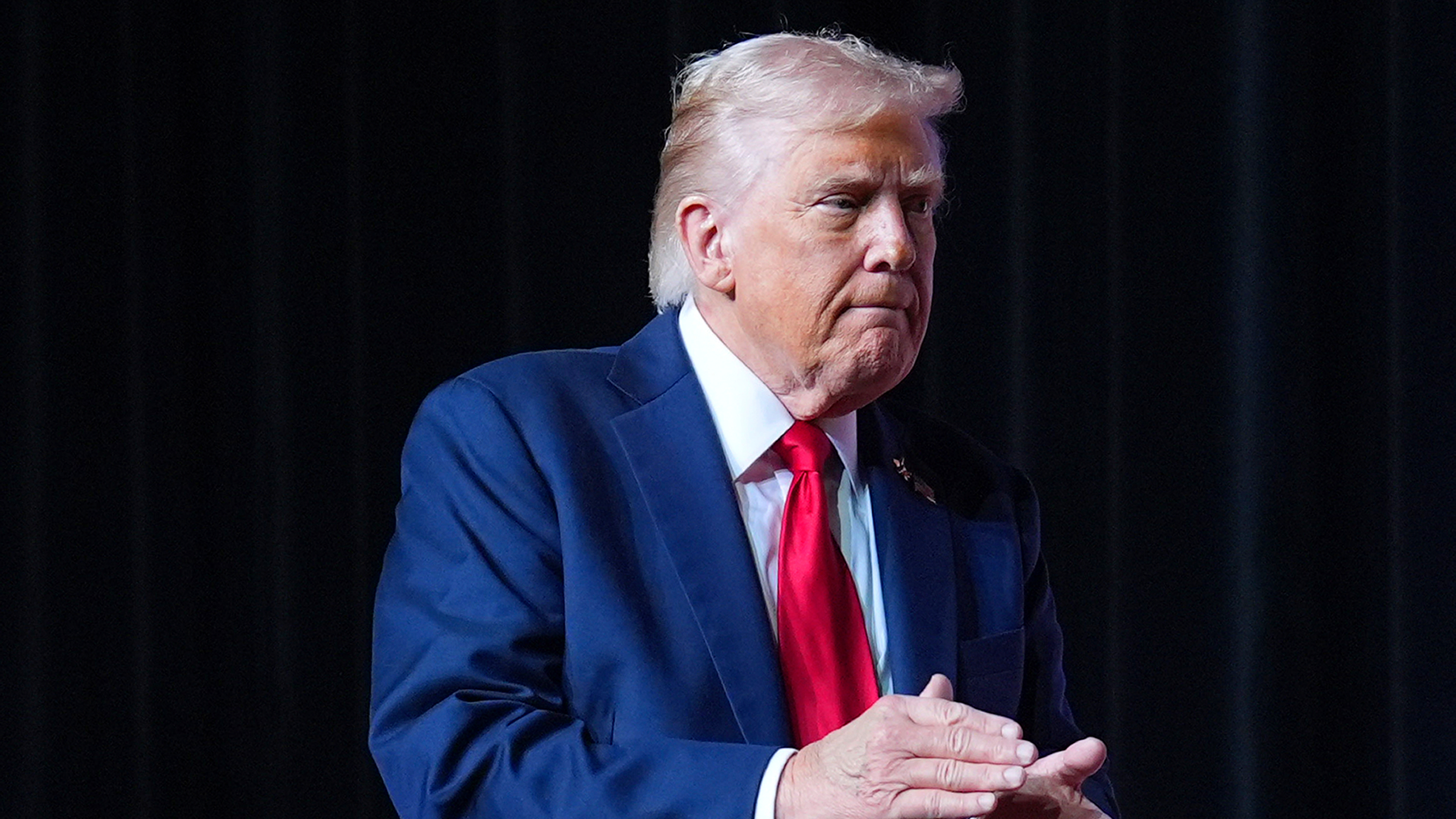 President Donald Trump walking off stage after speaking to a gathering of top U.S. military commanders at Marine Corps Base Quantico, Tuesday, Sept. 30, 2025, in Quantico, Va.