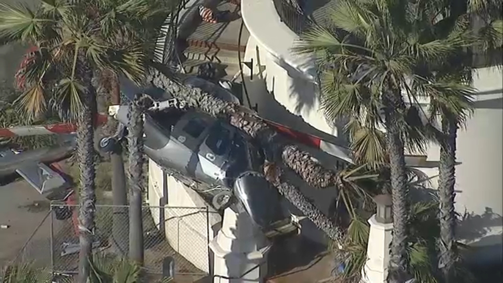 5 people injured after helicopter crashes into pedestrian bridge Huntington Beach