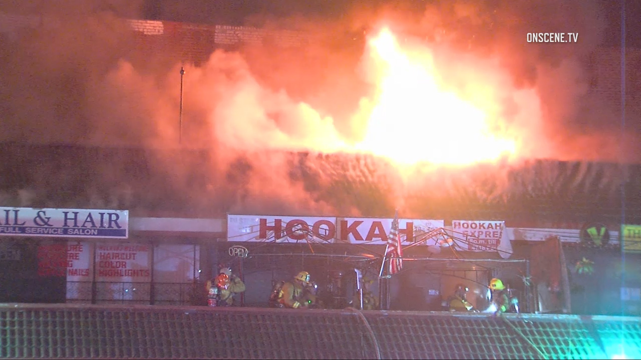 Fire erupts at strip mall in Hollywood