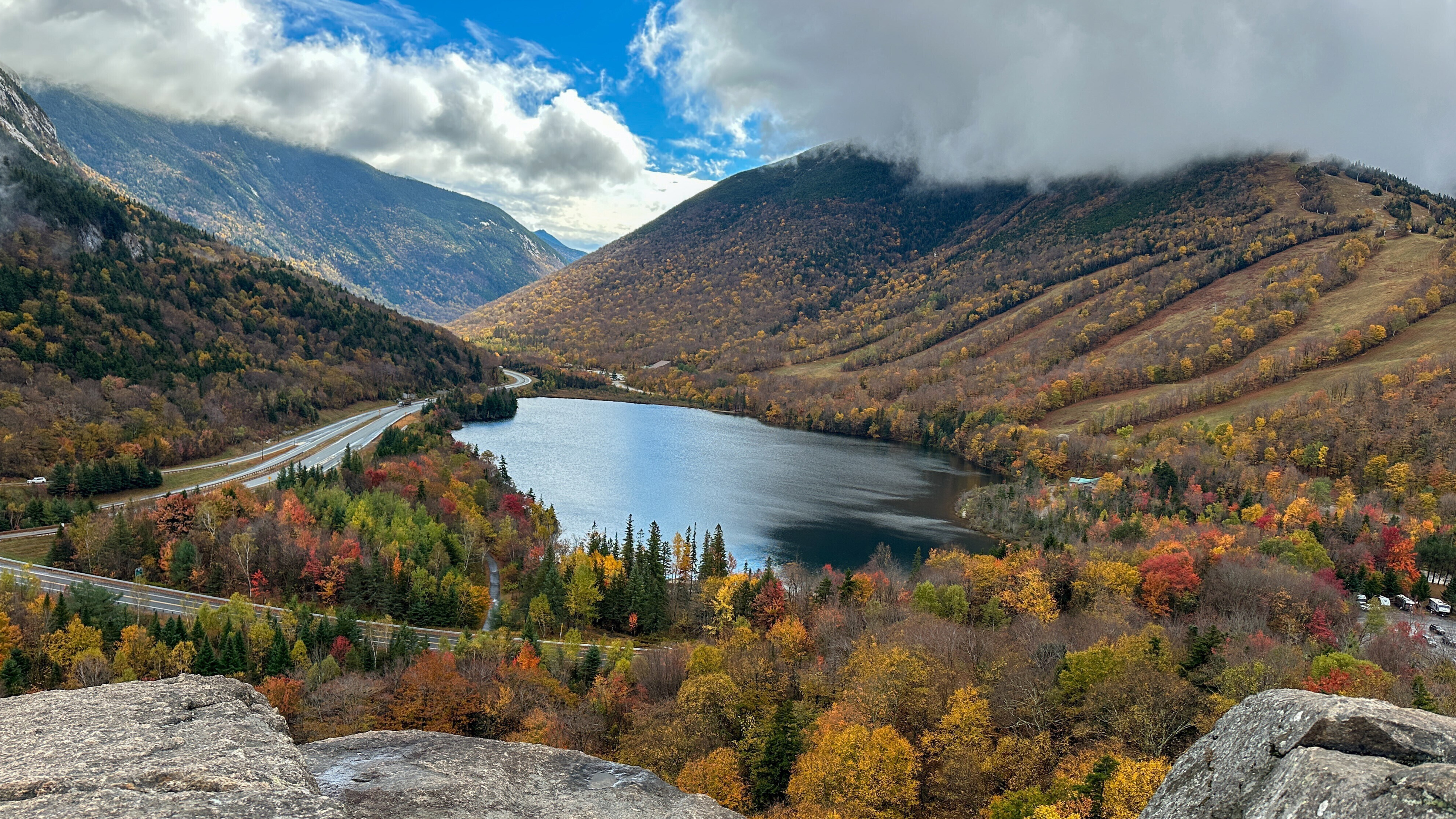 The view from Artists Bluff, a popular destination for fall foliage in Franconia Notch State Park in Franconia, N.H., Wednesday, Oct. 8, 2025.