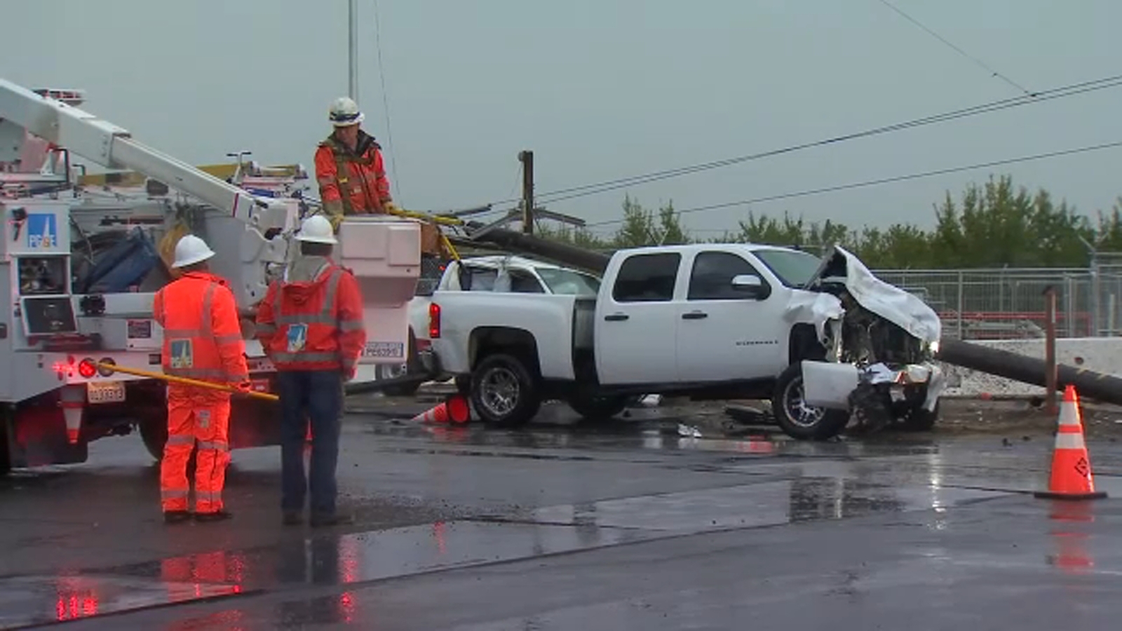 Power pole lands on two trucks in Fresno County, causing power outage