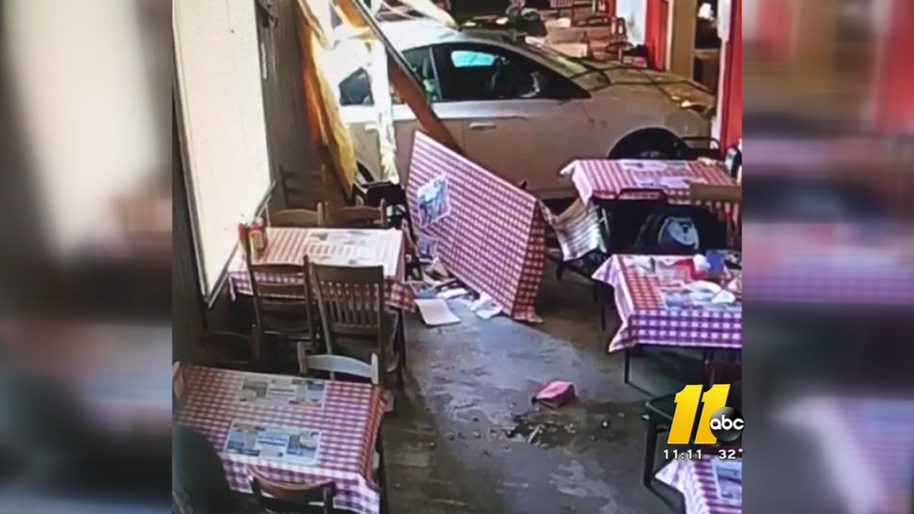 Car crashes through restaurant