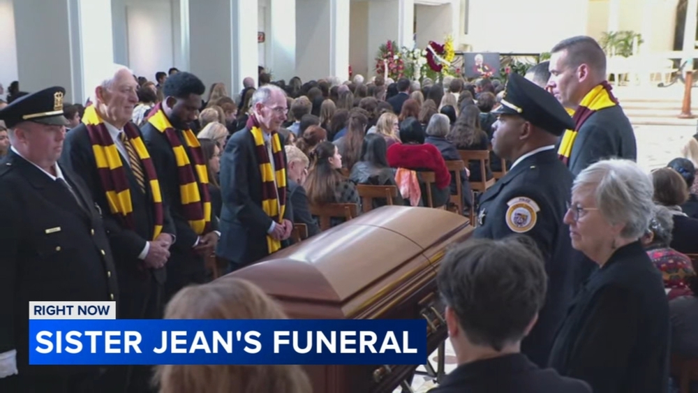 Mourners gather to say goodbye to Sister Jean