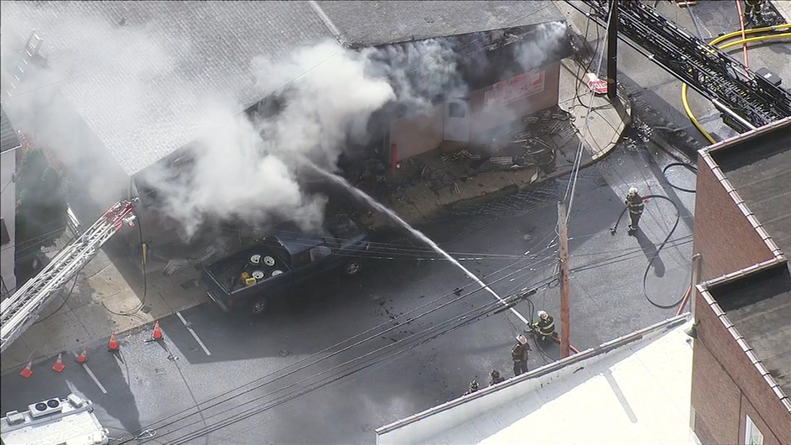 Crews battle fire at auto repair shop in Bridgeport, Pennsylvania ...