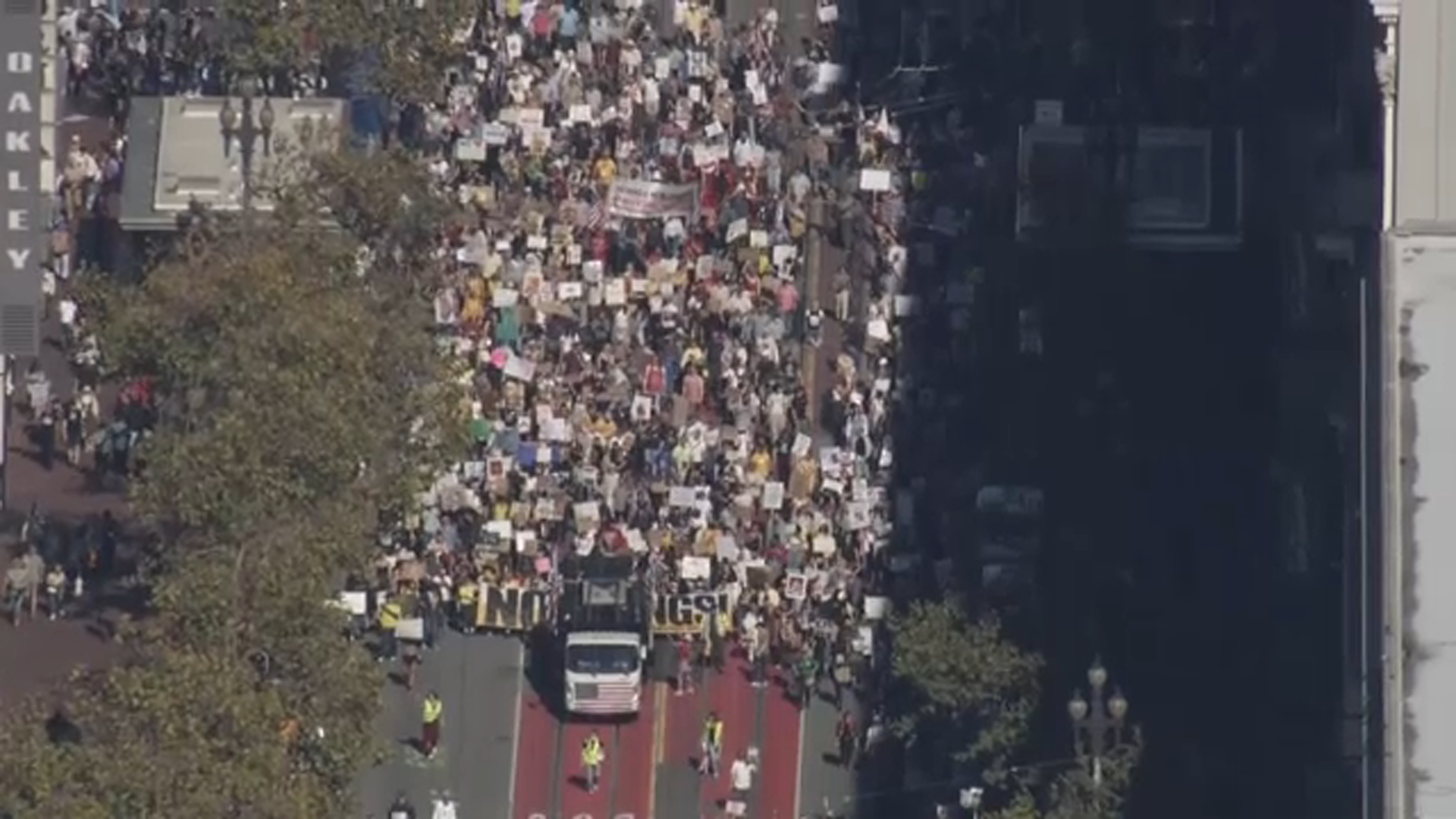 A large crowd of No Kings protesters moves through the streets of San Francisco on Saturday, Oct. 18, 2025.